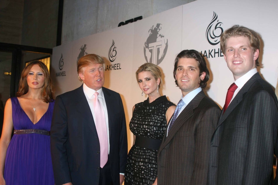 (From l. to r.) Melania and Donald Trump with their children Ivanka, Don Jr., and Eric, at a party to introduce the Trump Hotel and Tower in New York City on June 23, 2008.