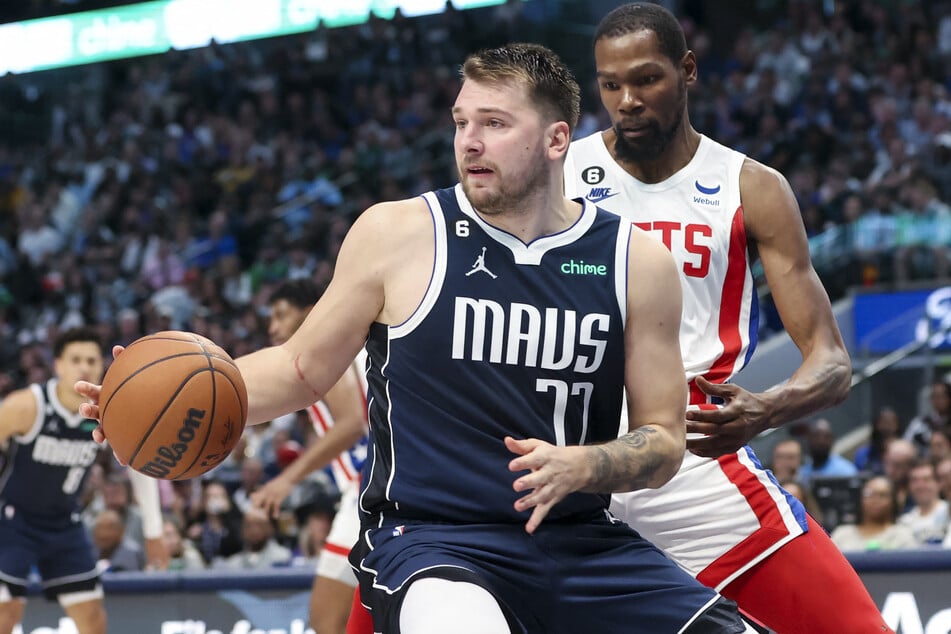 Dallas Mavericks guard Luka Doncic looks to score as Brooklyn Nets forward Kevin Durant defends during the fourth quarter at American Airlines Center.