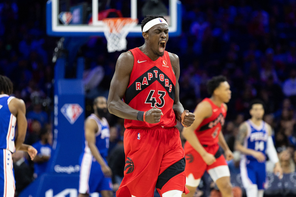 Pascal Siakam celebrates as the Raptors bring the series back to 3-2 against the Sixers.