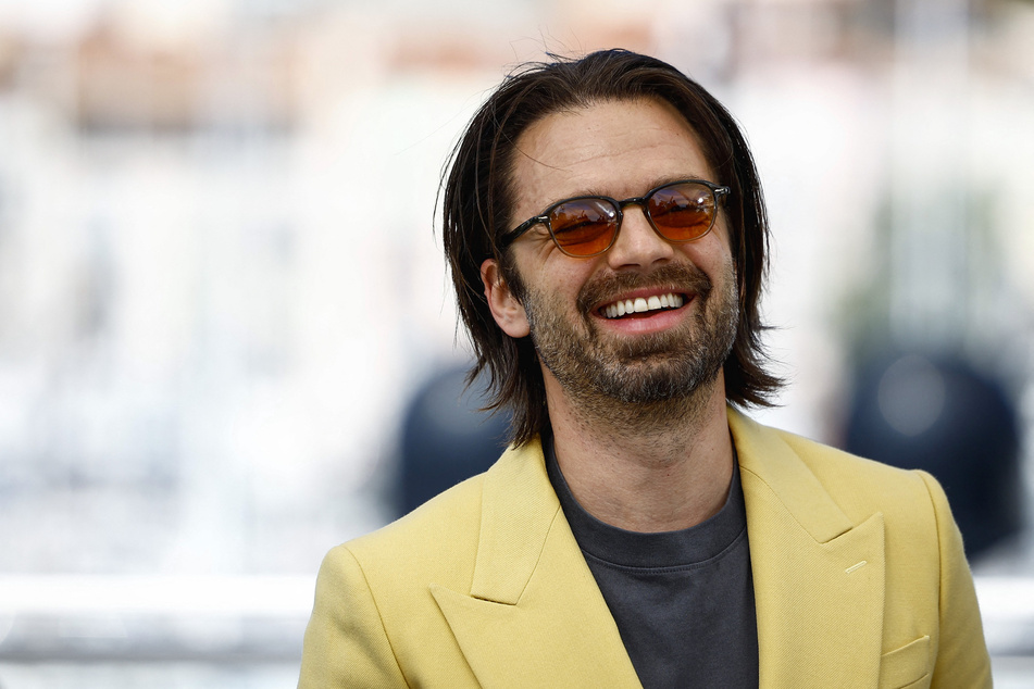 Sebastian Stan poses during a photocall for The Apprentice, in which he plays a younger Donald Trump, in competition at the 77th Cannes Film Festival.