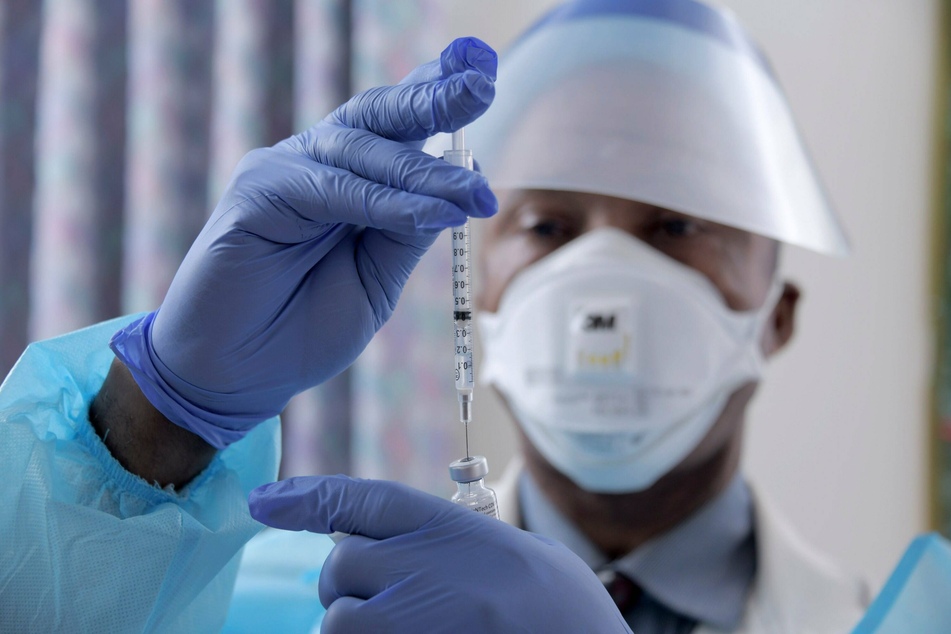 A pharmacist draws a coronavirus vaccine at a Maryland nursing home (stock image).