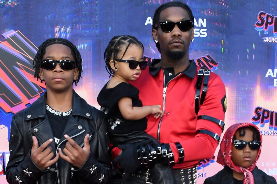 Rapper Offset (second from r) and his three boys Jorden Cephus (l), Wave Cephus (second from l), and Kody Cephus (r) rocked leather looks at the Spider-Man: Across the Spider-Verse premiere.