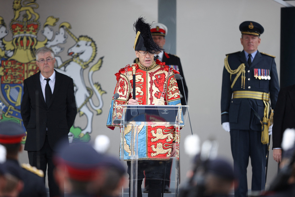 Wales Herald of Arms Extraordinary Thomas Lloyd speaks during the proclamation ceremony for King Charles.