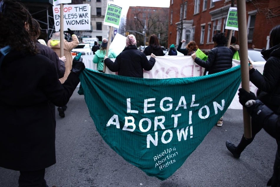 New Yorkers march for abortion rights following the 2022 Supreme Court overthrow of Roe v. Wade protections.