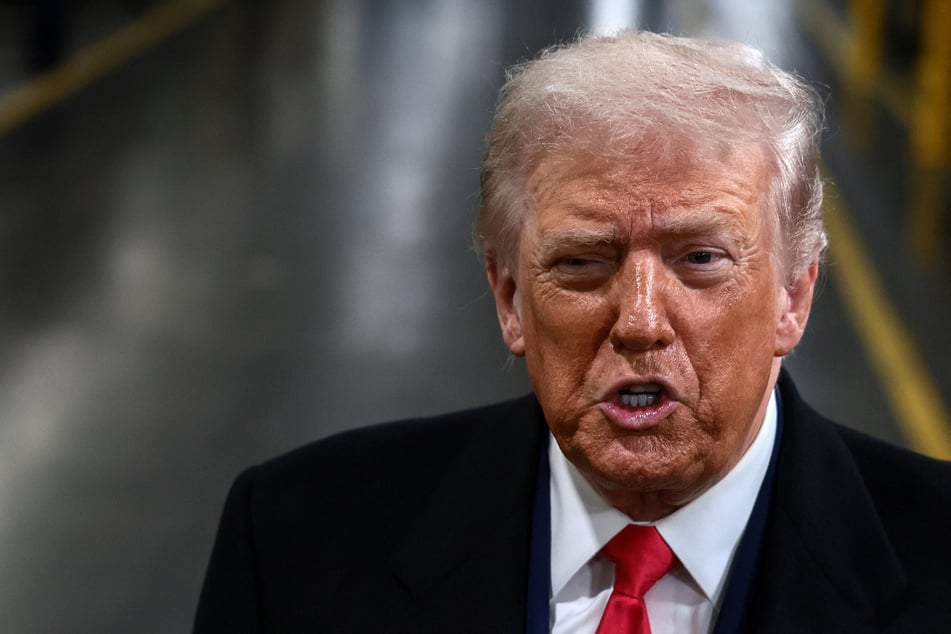 President Donald Trump visits a Ford production center in Dearborn, Michigan, on January 13, 2026.