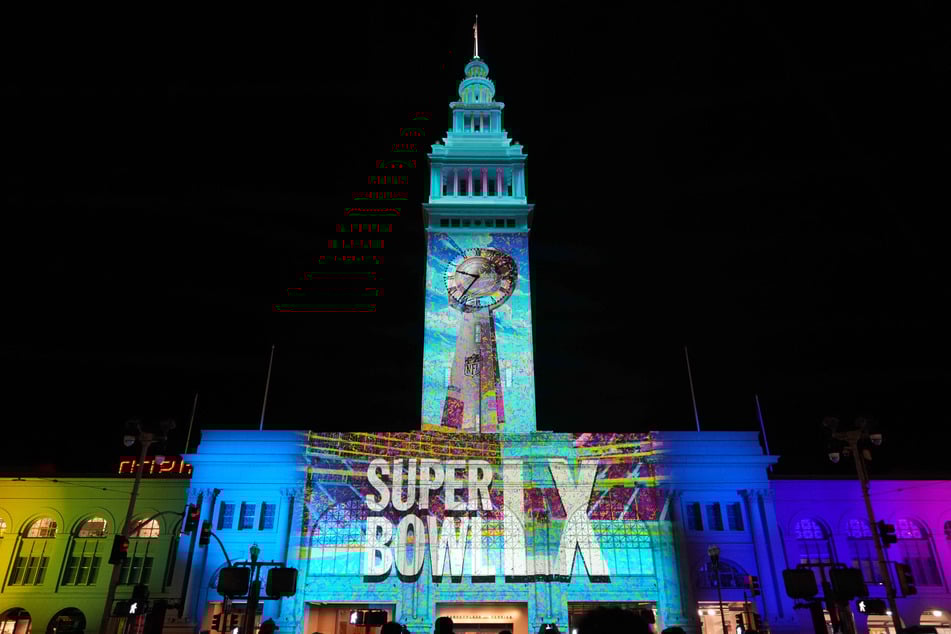 The Super Bowl LX logo is projected on the Ferry Building in San Francisco, California.