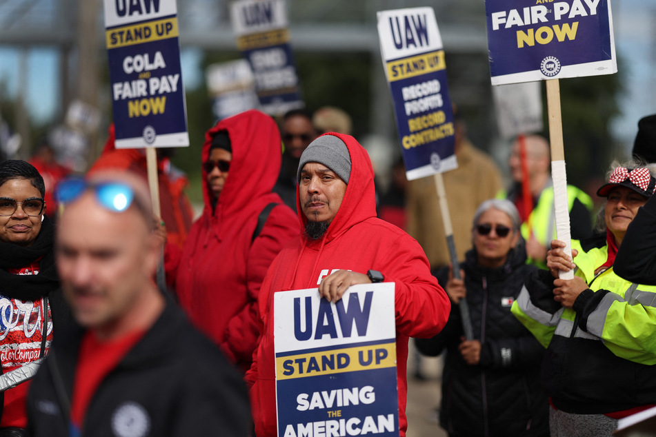 Striking auto workers picket outside of the Ford Assembly plant on October 10, 2023, in Chicago, Illinois.