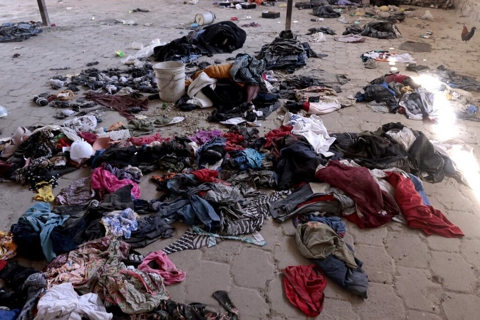 Clothes and shoes are pictured at the Izaguirre Ranch as the Guerreros Buscadores search the site.