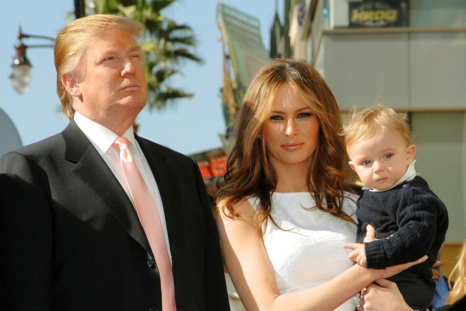 Donald Trump (l.) with his wife Melania and youngest son Barron during a ceremony where he received a star on the Hollywood Walk of Fame in Los Angeles, California in January 2007.