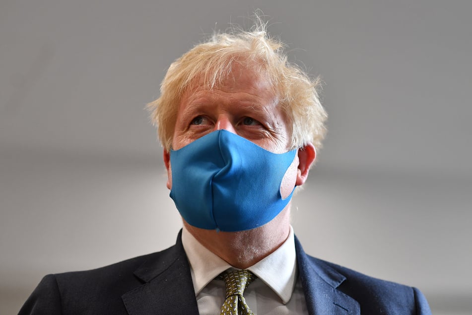 Der britische Premierminister Boris Johnson trug bei öffentlichen Auftritten bereits Maske, bald muss ganz England Mund und Nase bedecken - zumindest in Geschäften.