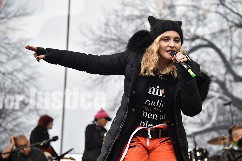Madonna performs onstage during the 2017 Women's March on Washington.