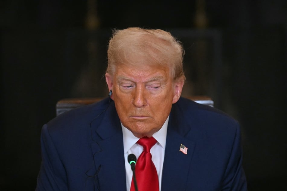 US President Donald Trump participates in a multilateral lunch with visiting African Leaders in the State Dining Room of the White House in Washington, DC, on Wednesday.
