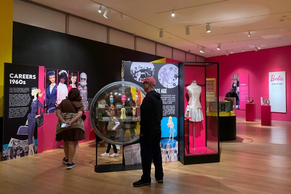 Barbie takes Manhattan in the Museum of Arts and Design's latest exhibit on the cultural impact of the iconic doll.