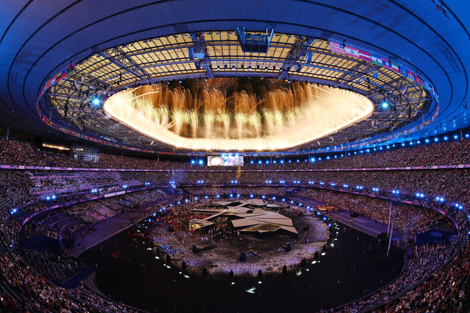 Athletes, stars, and fans attend the closing ceremony of the Paris Olympics at the Stade de France.