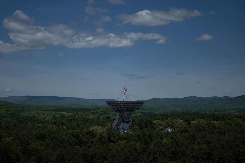 Nestled between mountains in a secluded corner of West Virginia, a giant awakens: the Green Bank Telescope begins its nightly vigil, scanning the cosmos for scientific secrets.