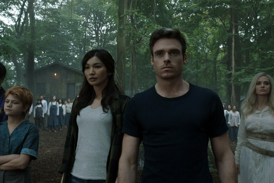 The cast of the Eternals from l to r: Lia McHugh as Sprite, Gemma Chan as Sersi, Richard Madden as Ikaris, and Angelina Jolie as Thena.
