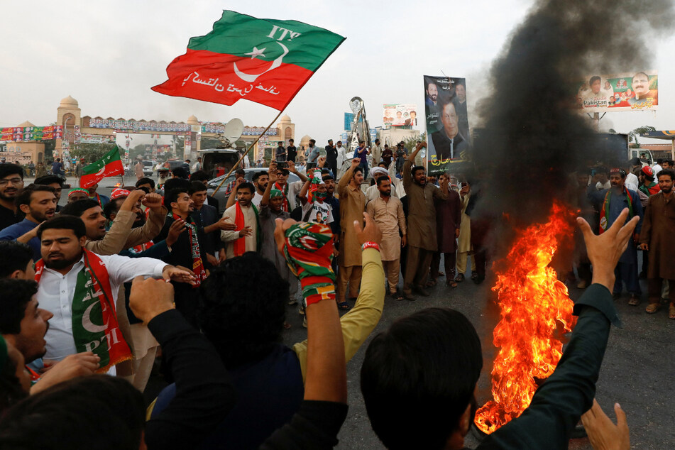 People in Pakistan burned tires to block a main highway in Wazirabad, Pakistan, on Friday during a protest to condemn the shooting of Pakistan's former Prime Minister Imran Khan.