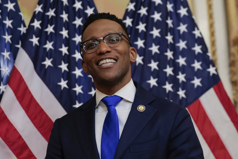 Representative Christian Menefee smiles during his swearing-in ceremony at the US Capitol on February 2, 2026.