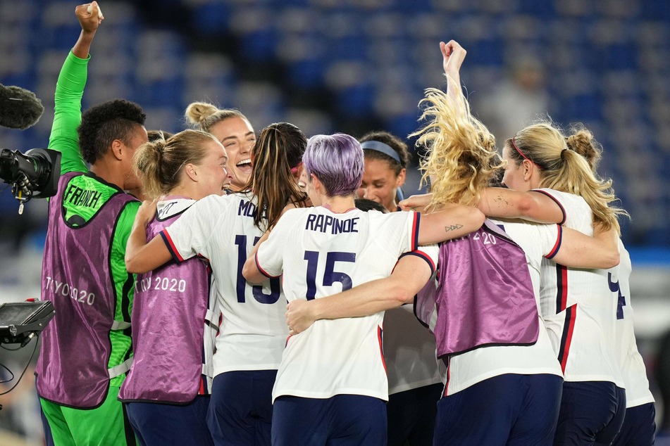 The US Women's national team celebrates their victory over the Netherlands after a penalty kick shoot-out in the quarterfinals of the Tokyo 2020 Olympic Games.