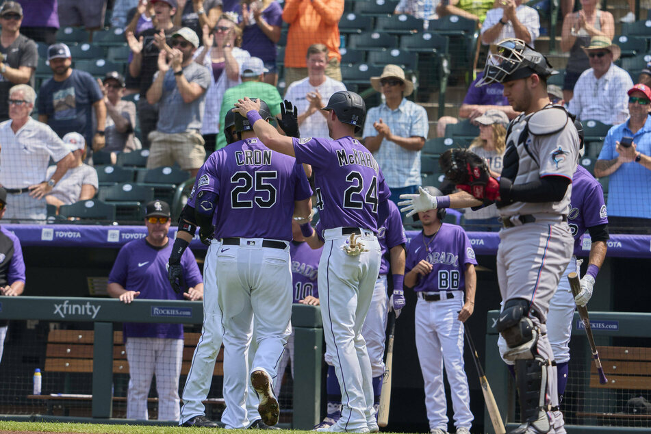 Members of the Colorado Rockies during their game against the Miami Marlins at Coors Field on Sunday.