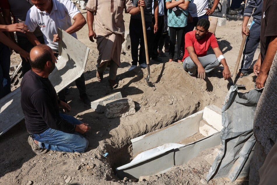 Mourners attend the funeral of 10-year-old Sama al-Debs, who was killed by Israel in the Jabalia refugee camp in the central Gaza Strip on October 18, 2024.