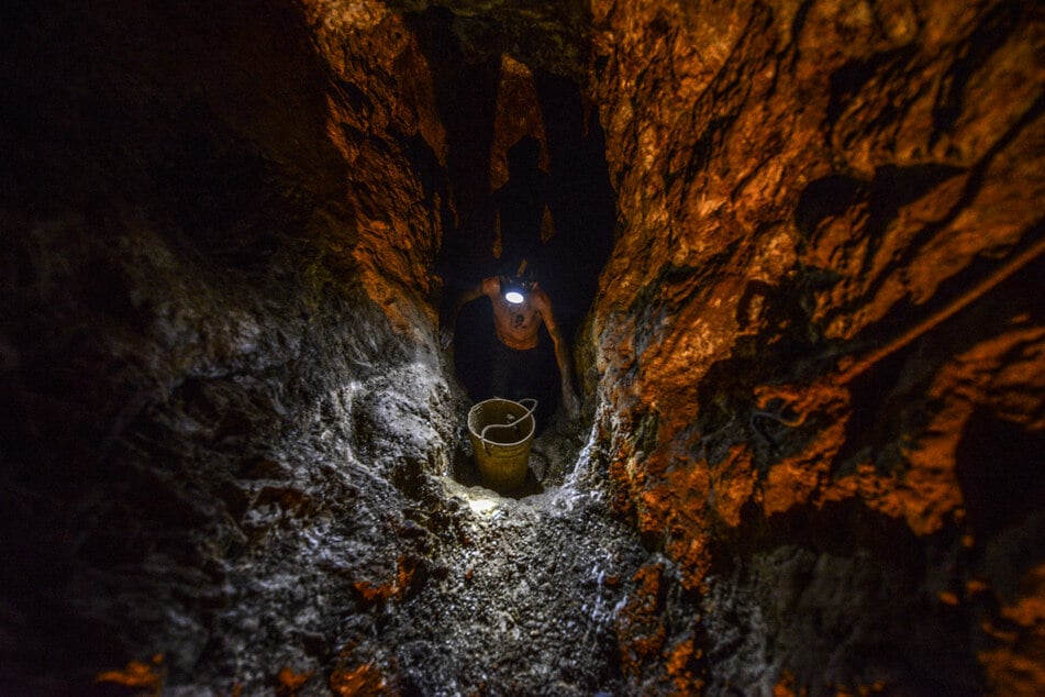 A man looks for gold at La Culebra gold mine in El Callao, Bolivar state, southeastern Venezuela.