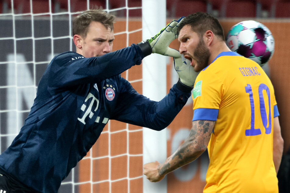 Ziehen die Bayern mit Manuel Neuer (l.) ins Finale der Klub-WM ein, treffen sie auf Tigres UANL mit Andre Pierre Cignac (r.).