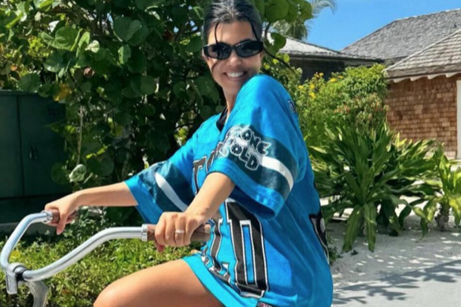 Kourtney Kardashian (pictured) is living the dream while enjoying her Bahamas vacay with Travis Barker and family.