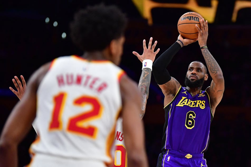 Los Angeles Lakers forward LeBron James shoots against the Atlanta Hawks during the second half at Crypto.com Arena.