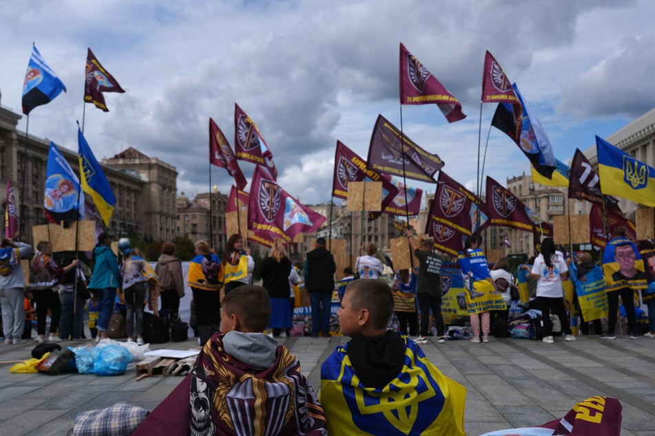 People gather for a rally in support of missing soldiers at the Independence Square (Maidan) on Ukraine's Independence Day, on Monday, amid the Russian invasion of Ukraine.