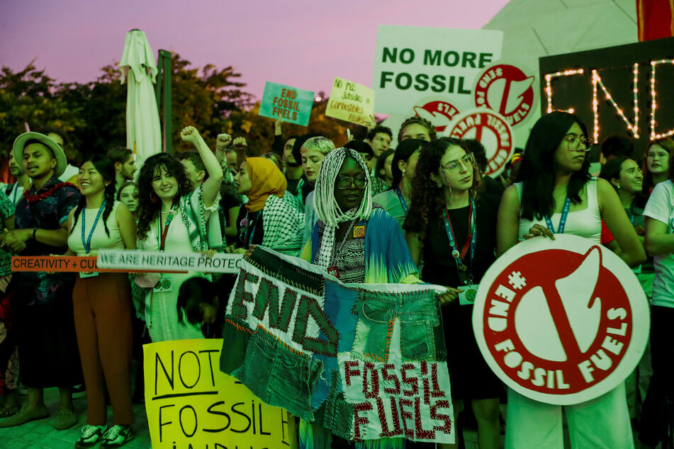 Activists protest against fossil fuels at Dubai's Expo City during the United Nations Climate Change Conference COP28 in Dubai.