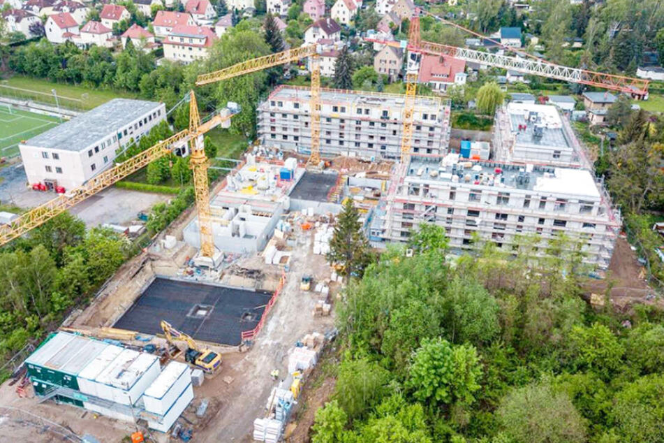 Neubau Wohnanlage bestehend aus 5 Mehrfamilienhäusern mit Tiefgarage in Dresden. Erstellung 2020