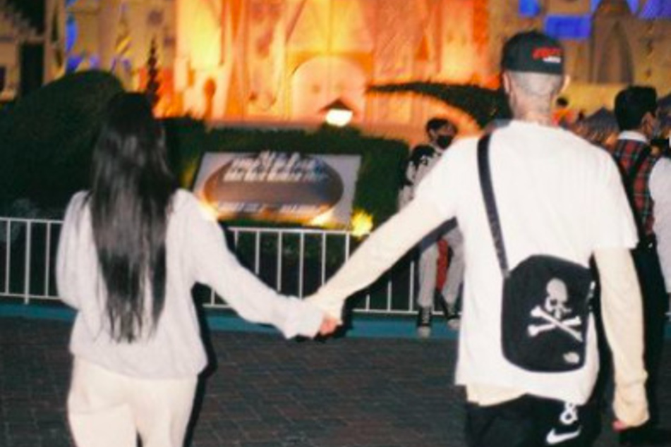 Kourtney shared Instagram photos of the couple on their recent trip to Disneyland.