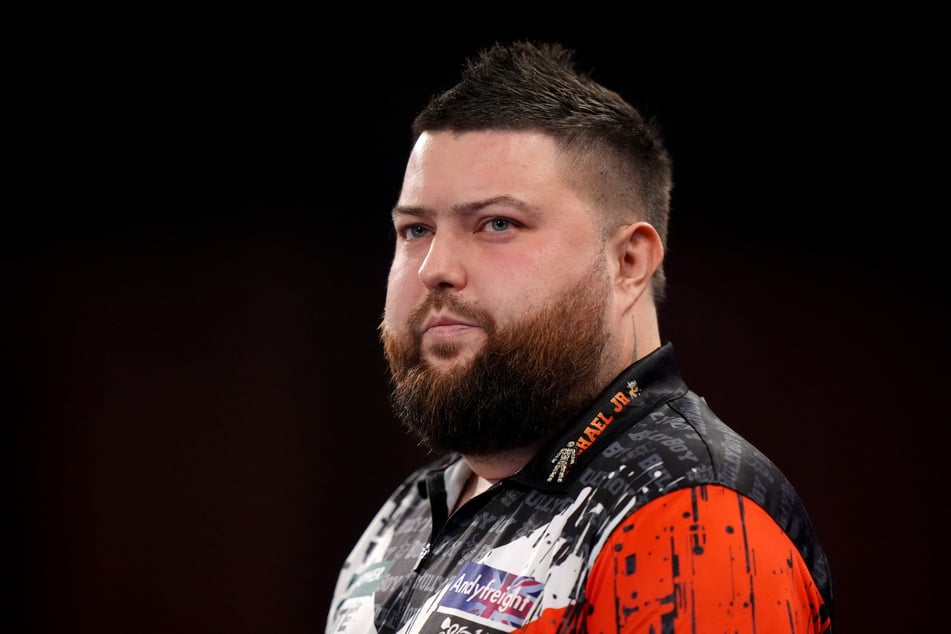 Failed in the first round: England's darts superstar Michael Smith (34).