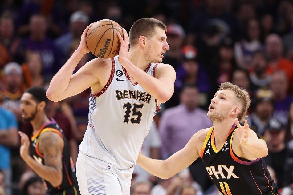 Ahead of Game 5 between the Denver Nuggets and the Phoenix Suns, fans are wondering whether Nikola Jokić (l) will be issued a heftier punishment after pushing the Suns' owner courtside.