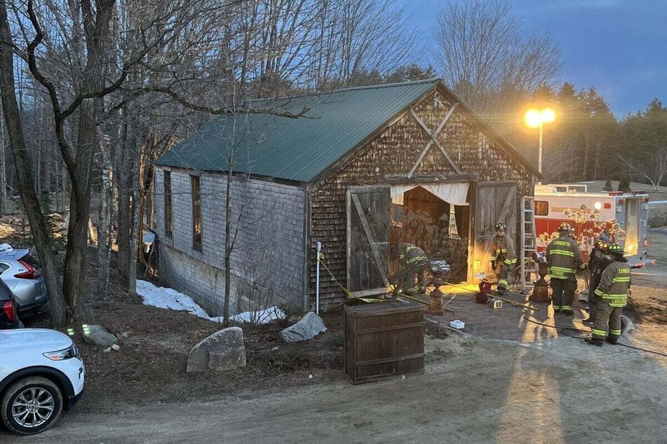 Firefighters and rescue workers provide medical care at the scene of the wedding floor collapse.