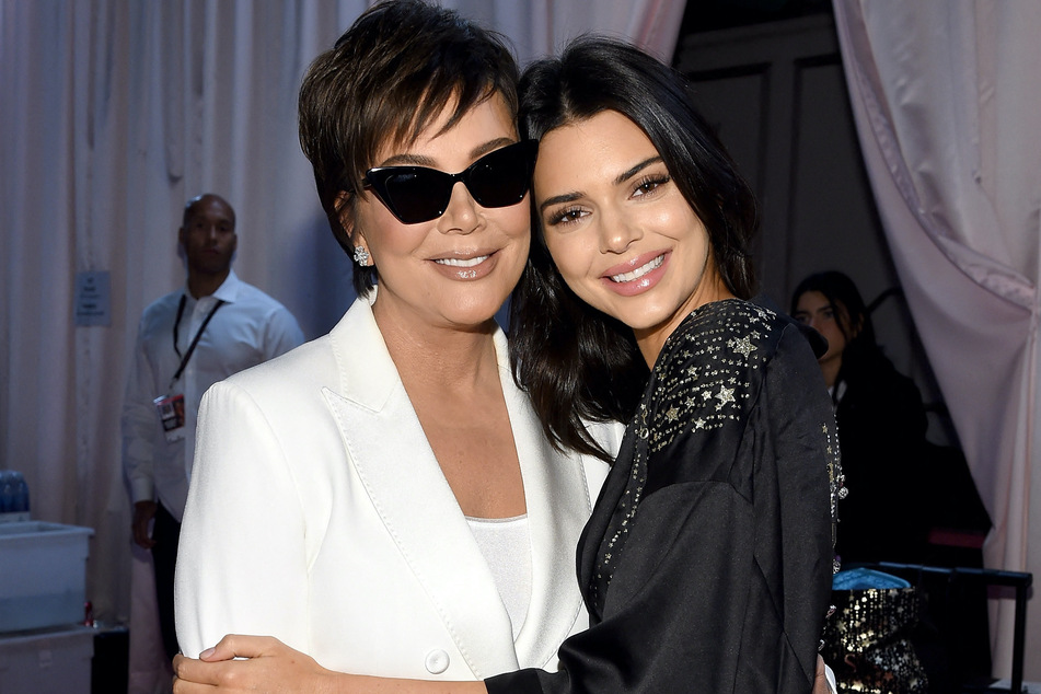 Kendall Jenner (r) touched on her work relationship with her momager, Kris Jenner (l).
