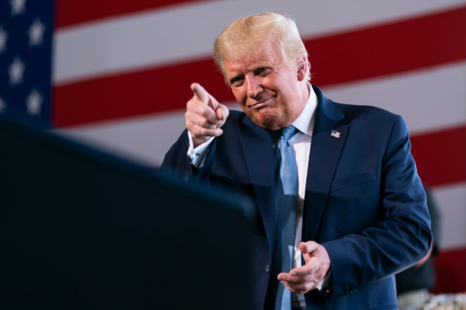 Donald Trump speaks to his supporters during an election campaign event at Yuma International Airport