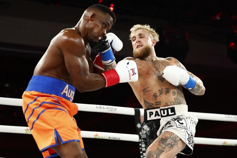 Jake Paul (r), a YouTube sensation turned pro boxer, will partner with USA Boxing to provide an inside look at preparations for the Paris Olympics.
