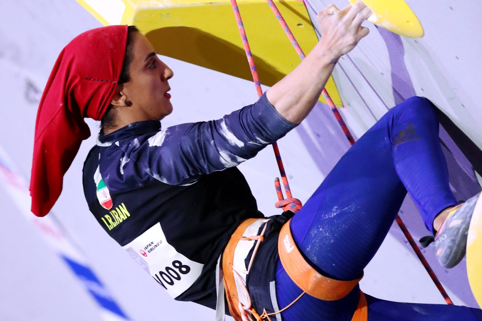 Elnaz Rekabi competing in 2019 while wearing a hijab.