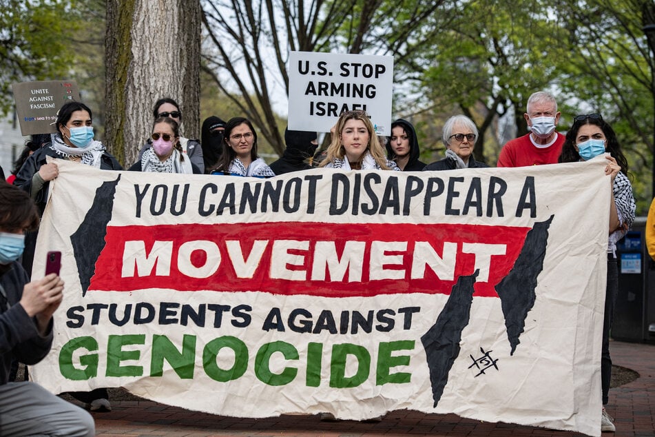 Demonstrators gather on Cambridge Common to protest Harvard University's stance on the war on Gaza and to show solidarity for the Palestinian people on April 25, 2025.