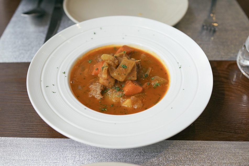 Even beef stews can look pretty! Garnish it with some parsley and a piece of bread!