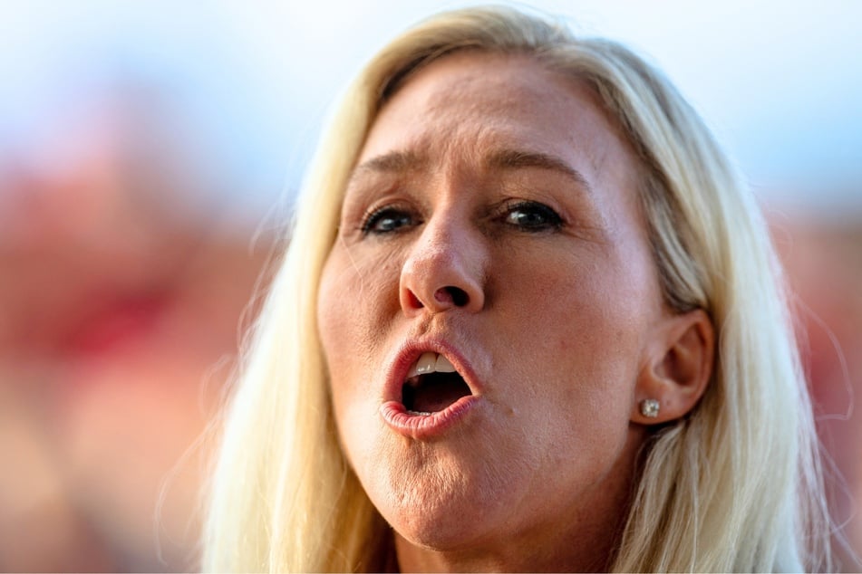 Seth Jason, a former employee of Voice of America, was arrested Thursday for allegedly threatening the life of politician Marjorie Taylor Greene (pictured) for years.