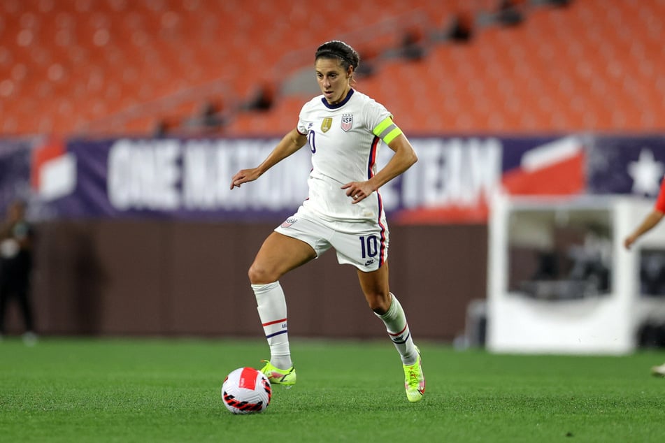 US forward Carli Lloyd scored five goals, tying a team record as the USWNT routed Paraguay 9-0.