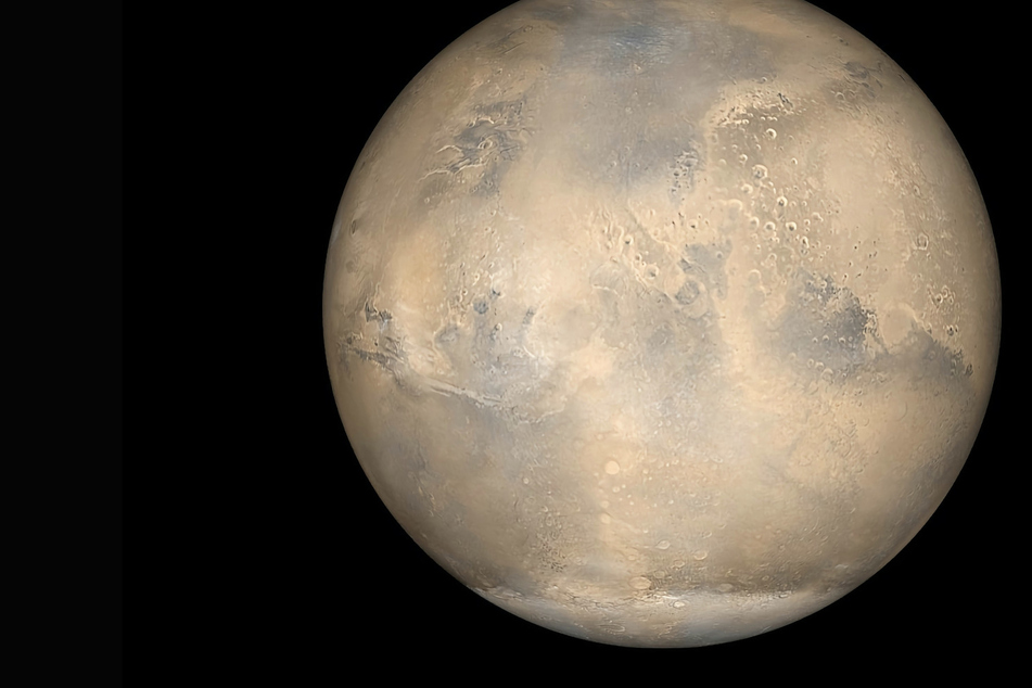 Frost discovered on top of giant Mars volcanoes gives clues to the planet's water dispersal