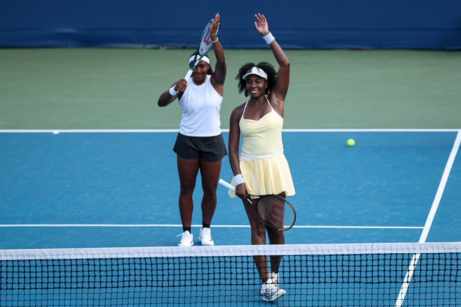 Venus Williams (r.) and Hailey Baptiste celebrate after winning their women's doubles match against Eugenie Bouchard and Cleave Ngounoue (not pictured) during day 1 of the Mubadala Citi DC Open 2025 at William H.G. FitzGerald Tennis Center on July 21, 2025.