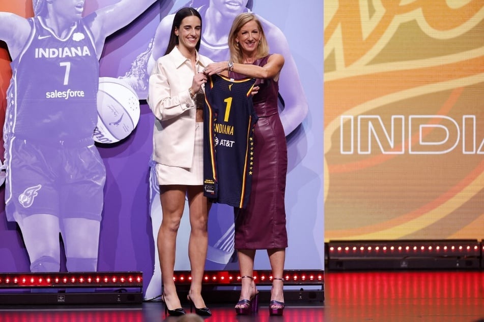 Caitlin Clark (l.) has driven WNBA sales to historic numbers since being drafted to the Indiana Fever.