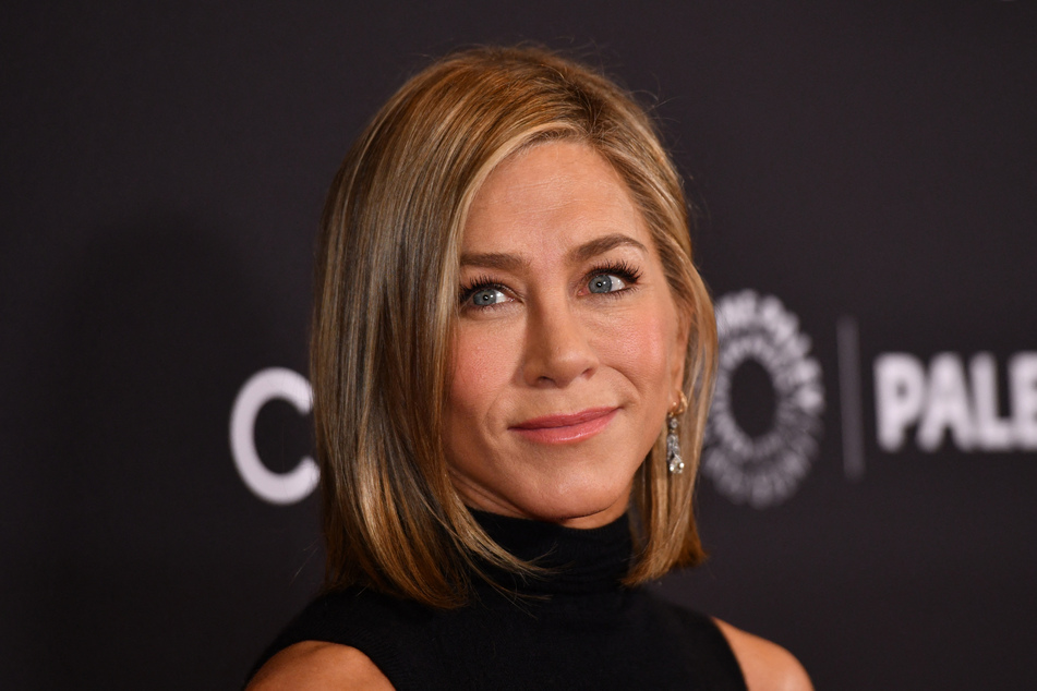 Jennifer Aniston (pictured) got emotional as she reflected on rewatching Friends following the tragic death of her co-star, Matthew Perry.