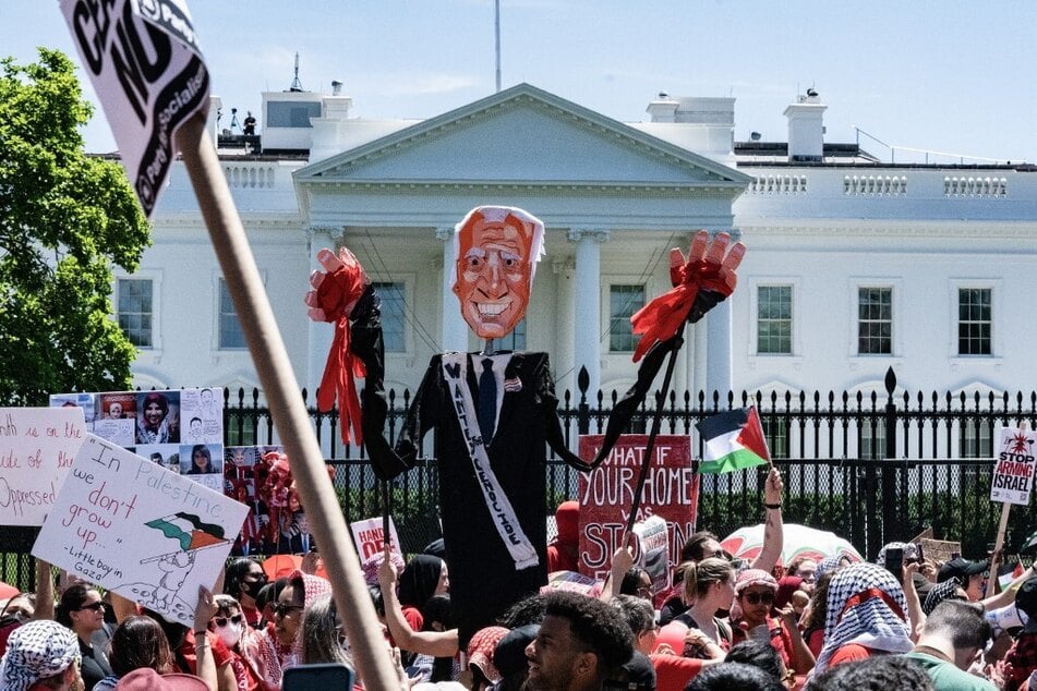 Demonstrators rally outside the White House to protest the Biden administration's continued support for Israel's attacks on Gaza.