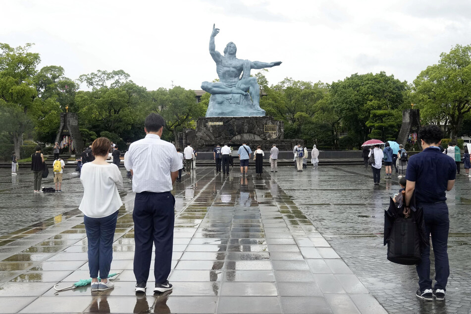 People in Nagasaki bowed their heads in prayer on the anniversary of the August 9, 1945 nuclear bomb attack on the city.